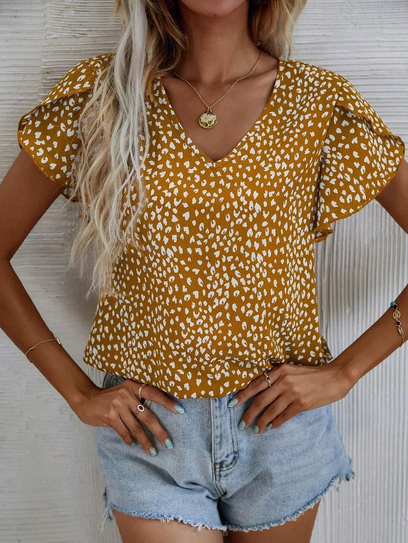 Cassidy | Chique blouse met abstracte print